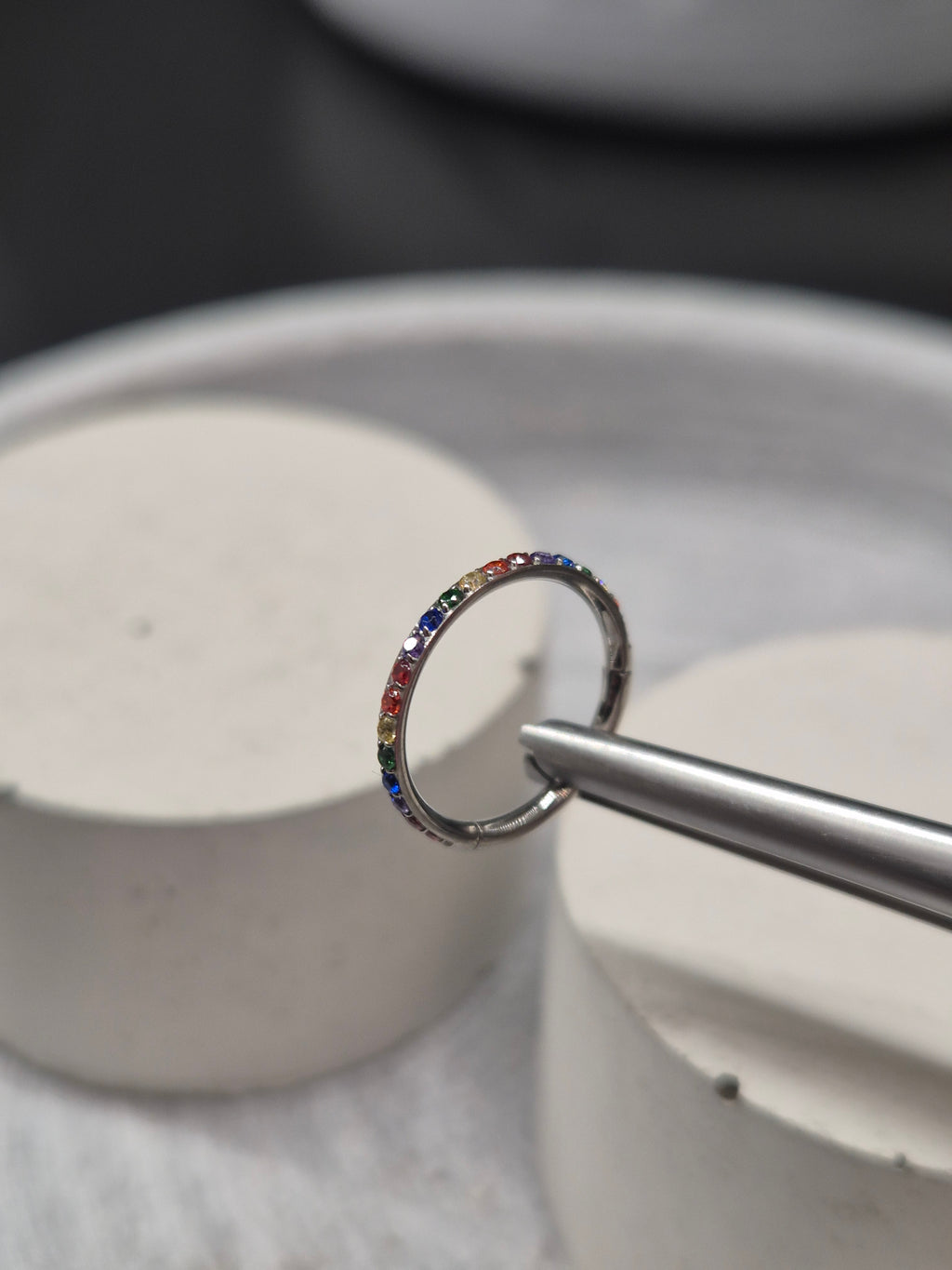 Hinged segment ring 36