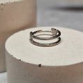 Hinged segment ring 24
